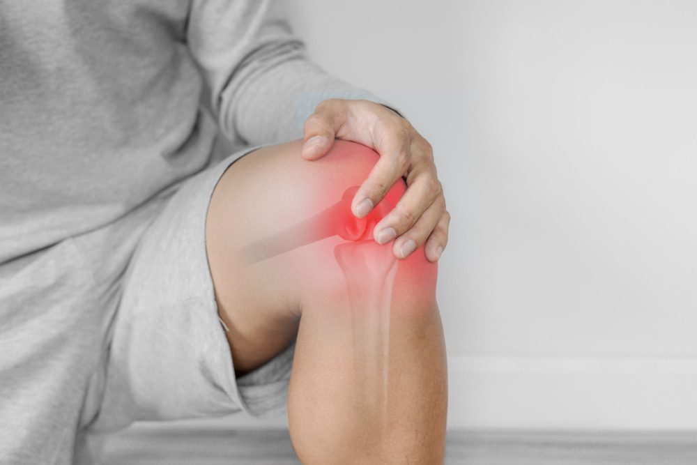joint pain arthritis tendon problems man touching knee bone disease 